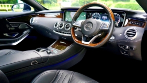 vehicle-interior-with-touchscreen-and steering-wheel-RocketChip-luxurious-interior-car-modifications