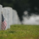 american-flag-at-headstone-RocketChip-memorial-day-travel